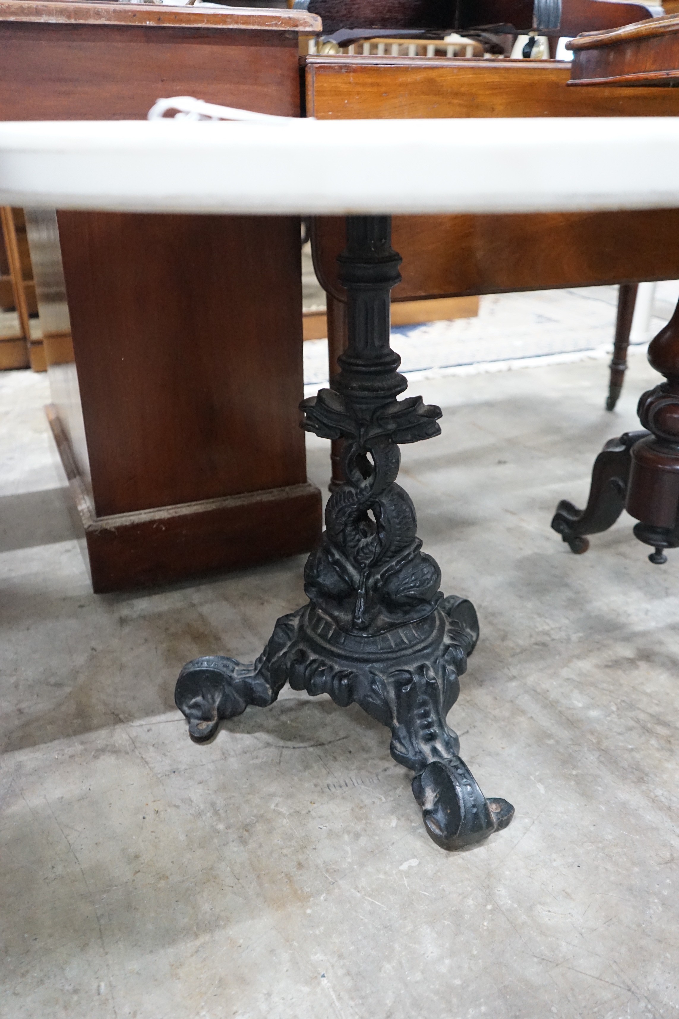 A Victorian style circular cast iron and reconstituted marble top occasional table, diameter 75cm, height 84cm